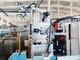 Alimentador robotizado para cuerpos de lata