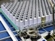 Flejadora automática de latas con cuerda de sujeción